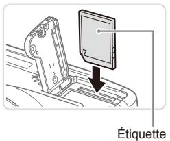 CANON POWERSHOT SX50 HS - Insérez la batterie. - 1