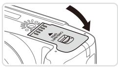CANON POWERSHOT SX50 HS - Insérez la batterie. - 2
