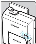 CANON 1100D - Insérez la batterie. - 1