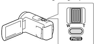 SONY HDR-CX410VE - Podczas odtwarzania obrzów przesunć widocznych na ekranie LCD ramkę wyboru, korzystajć z dzwigni regulacji zblżenia, po czym nacinść przycisk PHOTO. - 1