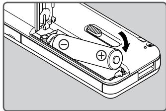 OLYMPUS WS-811 - Insérez la pile en respectant les polarités correctes  et - 1