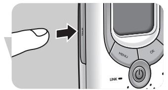 Diagram showing a finger pointing to a device with labeled buttons including MENU, OK, and LINK