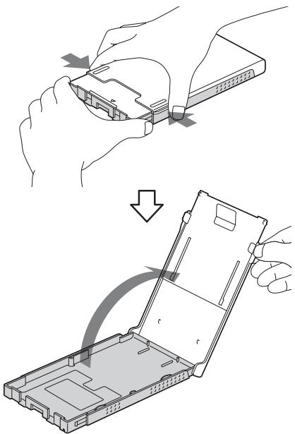 SONY DPP-FP65 - Ouvrez le couvercle du magasin à papier. - 1