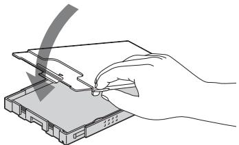 SONY DPP-FP75 - Insérez du papier d'impression dans le magasin à papier. - 2