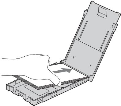 SONY DPP-FP75 - Insérez du papier d'impression dans le magasin à papier. - 1