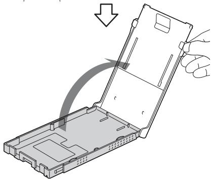 SONY DPP-FP75 - Ouvrez le couvercle du magasin à papier. - 2