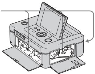 SONY DPP-FP85 - Retirez le magasin à papier et le ruban encreur de l'imprimante, et vérifie s'il n'y a pas de papier coince à l'intérieur. - 1