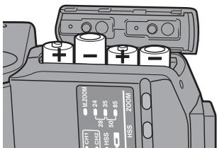 SONY HVL-F36AM - Insert the batteries in the battery chamber as in the diagram. - 1