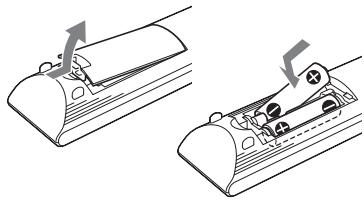 SONY HT-CT660 - Insertion des piles dans la télécommande - 1