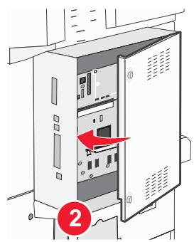 Diagram of a computer tower with labeled components and a red arrow pointing to a device panel, marked as item 2.