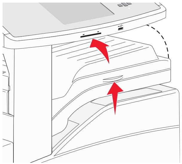 Line drawing of a printer interior showing internal structure with two red arrows indicating flow or movement (no text or symbols present)