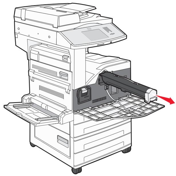 Line drawing of a printer with a paperclip inserted into the base frame (no text or symbols).