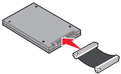 Diagram showing a device being inserted into a cable, with no visible text or symbols.