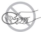 Diagram showing a hand holding a CD with a prohibition symbol, indicating no restrictions on the CD.