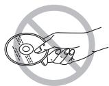 Diagram showing a hand holding a CD with a circular label containing text, crossed out by a diagonal line through a circle labeled 'No Prohibit'.
