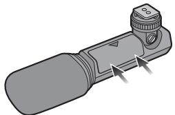 PANASONIC DMW-MS1E - Schlieben Sie die Batteriefach-Abdeckung. - 1