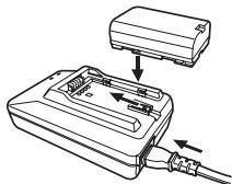 PANASONIC PVGS16 - Attach the Battery to the AC Adaptor and charge it. - 1