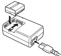 PANASONIC PVGS31 - Attach the Battery to the AC Adaptor and charge it. - 1
