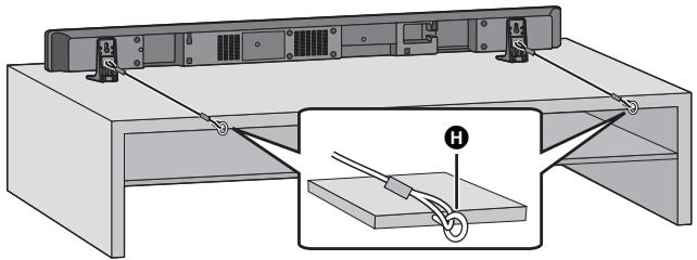 PANASONIC SC-HTB520 - Placez l'appareil dans la position désirée et fixez chaque cordelette au meuble ou à la table. - 1