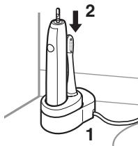 PANASONIC EW-DL82 - Introduza a ficha de alimentação na tomada eléctrica. - 1