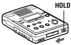 SONY MZ-B50 - Déverrouillez le bouton de commande. - 1