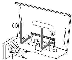 SONY MZ-B50 - La tapa del compartimento de las pilas - 3