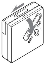 SONY MZ-N710 - Insert an MD. - 1