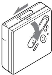 SONY MZ-N710 - Insert an MD. - 1
