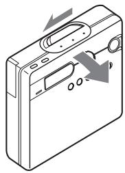 SONY MZ-N910 - Insert an MD. - 1