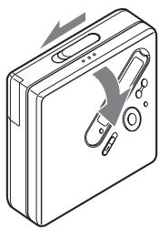 SONY MZ-NF810 - Insert an MD. - 1