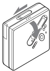 SONY MZ-NF810 - Insert an MD. - 1