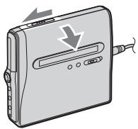 SONY MZ-NH1 - Insert a recordable disc. - 1