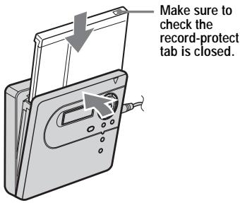 SONY MZ-NH600 - Insert a recordable disc. - 2