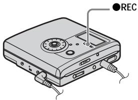 SONY MZ-NH900 - While the recorder is stopped, press and slide  REC on the recorder. "REC" lights up and recording starts. - 1