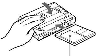 SONY MZ-R50 - Insert an MD. - 2