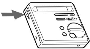 SONY MZ-R70 - Insert an MD. - 1
