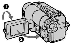 Diagram showing two cameras with labeled parts, illustrating camera assembly and rotation mechanism