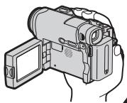 Line drawing of a handheld electronic device with a screen and lens (no text or symbols)