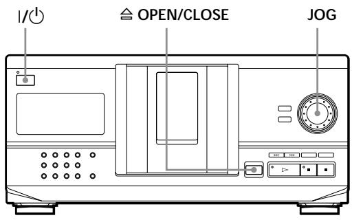 SONY CDP-CX235 - CD's plaatsen - 1