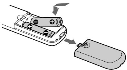 SONY CDP-XE270 - Inserting Batteries Into the Remote Control (CDP-XE570/XE370 only) - 1