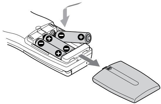 SONY CDP-CX555ES - Inserción de las pilas en el mando a distancia - 1