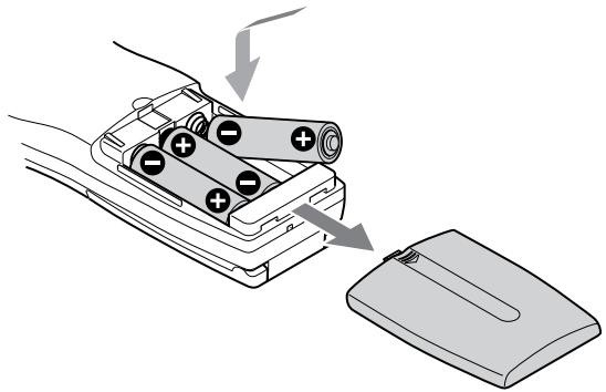 SONY CDP-CX555ES - Colocar pilhas no telecomando - 1
