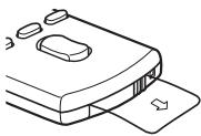 Line drawing of a device with a handle and scroll, no text or symbols present.
