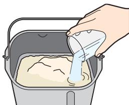 PANASONIC SD-ZB2502BXA - Doe de afgepaste ingrediënten in het bakblik - 2