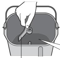 PANASONIC SD-2511 - Rimuovere il cestello del pane e posizionare la lama impastatrice - 2