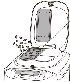 PANASONIC SD 2500 WXE - Remove the bread pan and set the kneading blade - 5