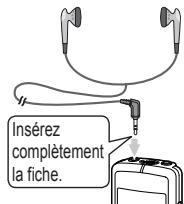 Insérez complètement la fiche.