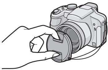 PANASONIC LUMIX DMC-FZ28 - Fixer le capuchon d'objectif. - 1