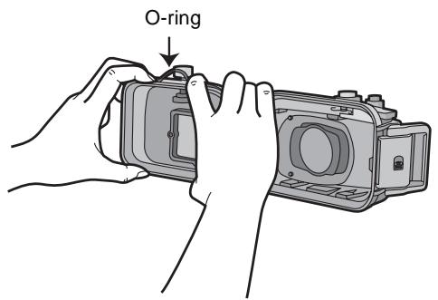 PANASONIC LUMIX DMW-MCTZ3E - Allentare l'O-ring con le dita per rimuoverlo. - 1