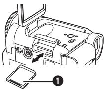 PANASONIC NV-GS180EK - Plaats/verwijder de kaart in/uit de houder. - 1